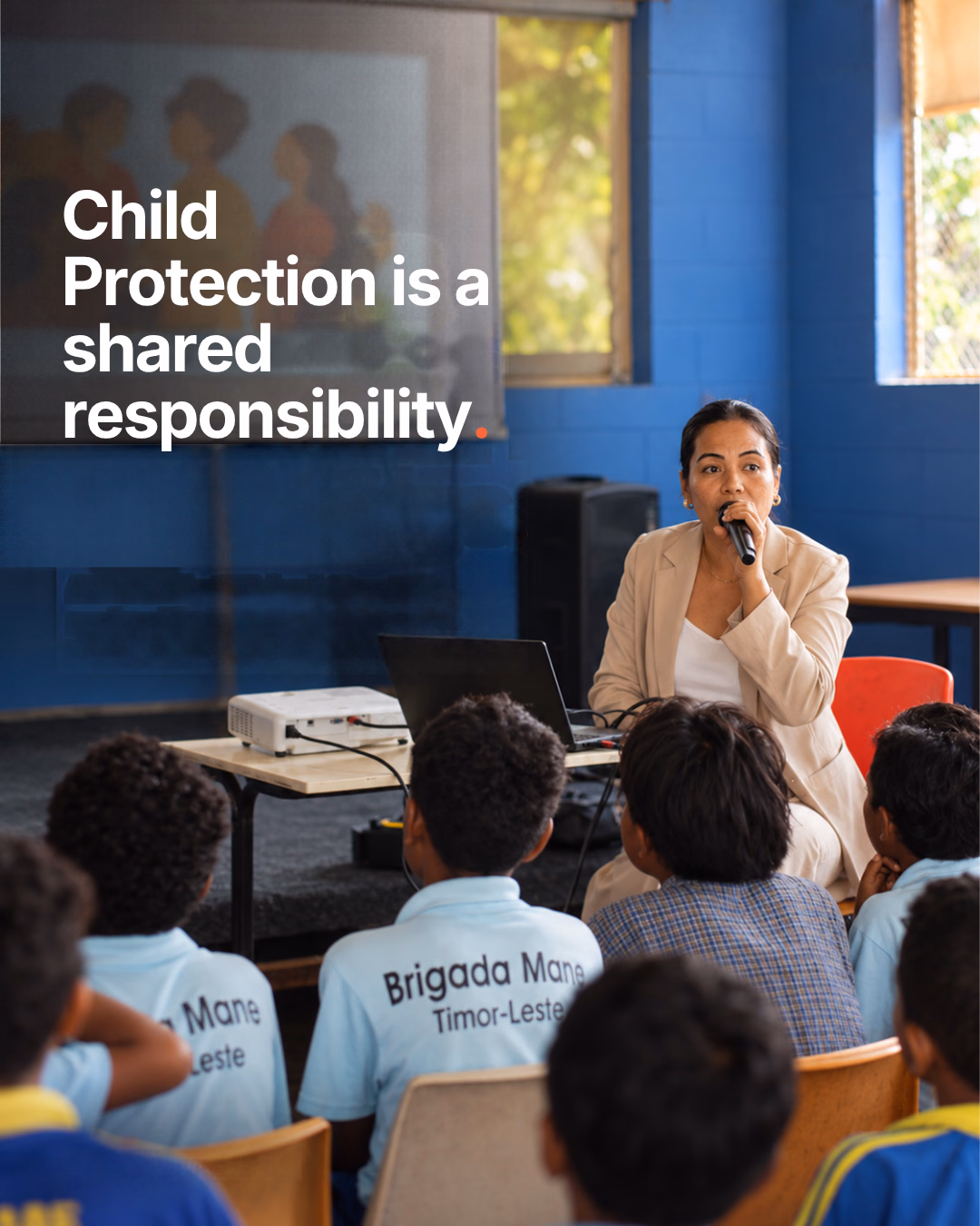 School staff speaking to students during the Casa Vida awareness session