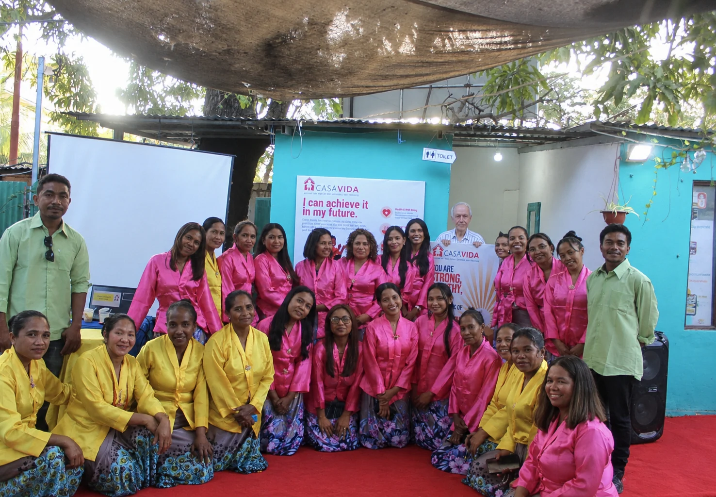 Casa Vida staff and participants gather at the event.