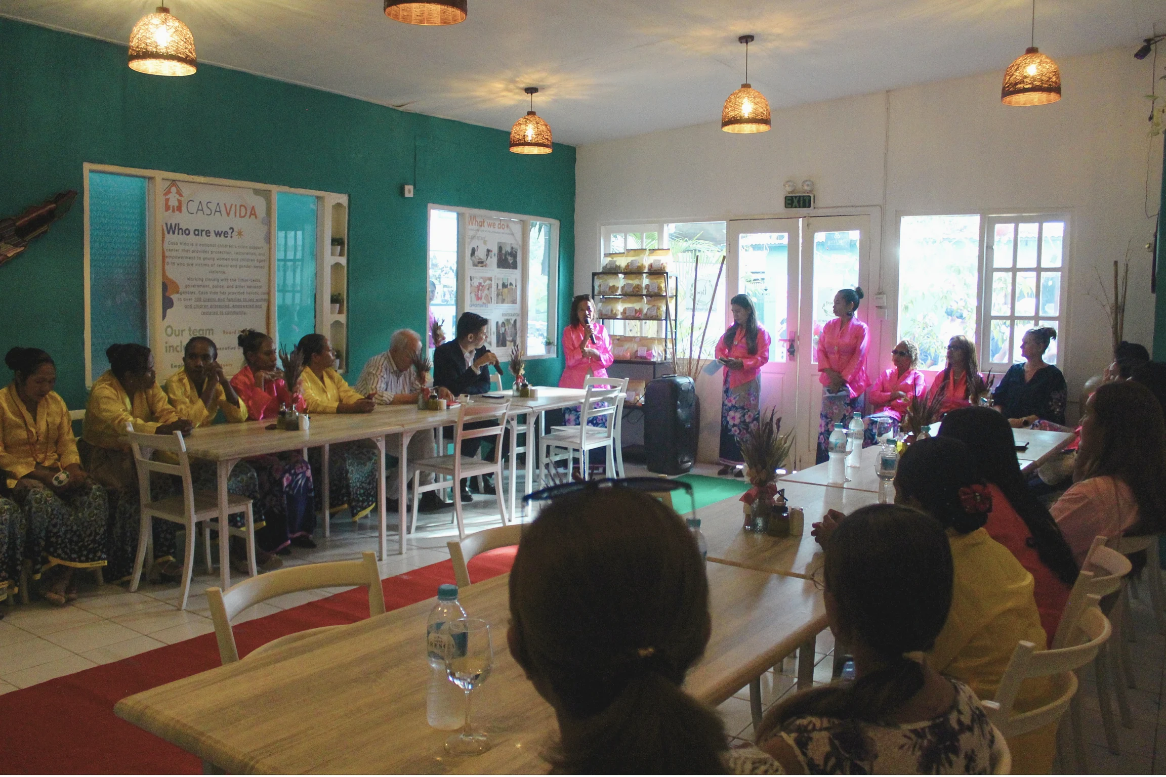 Participants take part in a gathering at Casa Vida.